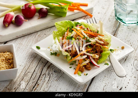 Honey peanut chicken lettuce cups Stock Photo