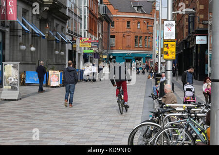 Shoppers and pedestrians in Befast. The pedestrian zone is in Arthur Street Belfast.