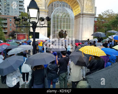 New York City, USA. 11th Oct, 2017. Attendees at the opening ceremony for one of the installations by Ai Weiwei in Washington Square Park. The Public Art Fund is presenting Ai's citywide exhibition “Good Fences Make Good Neighbors” through February 2018. Credit: Ward Pettibone/Alamy Live News Stock Photo