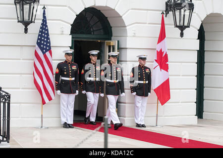 Washington, USA. 11th Oct, 2017. United States Marines walk through the doors of the South portico of the White House prior to the arrival of the Prime Minister of Canada Justin Trudeau and his wife Sophie Grégoire at the White House on October 11th, 2017 in Washington, DC Credit: Alex Edelman/CNP - NO WIRE SERVICE · Credit: Alex Edelman/Consolidated/dpa/Alamy Live News Stock Photo