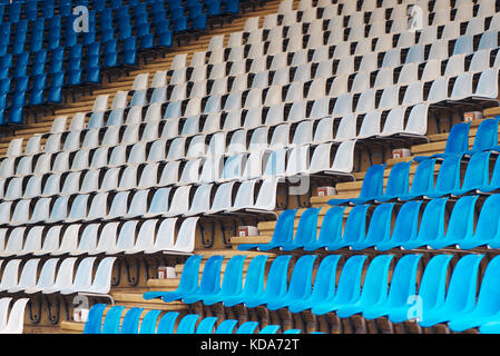 Blue and white plastic stadium seats as repeating pattern Stock Photo