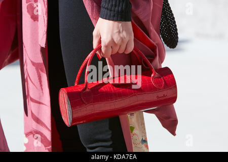 Woman with Red Shiny Louis Vuitton Bag and Floral Dress before Alberto  Zambelli Fashion Show, Milan Fashion Editorial Stock Photo - Image of  outfit, floral: 194566788