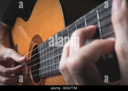 A man playing classical guitar. Stock Photo