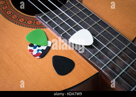 Guitar Picks on Classical Guitar Stock Photo