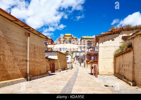 Street in Songzanlin Monastery, also known as Sungtseling, Ganden Sumtsenling or Little Potala Palace, Yunnan, China. Stock Photo