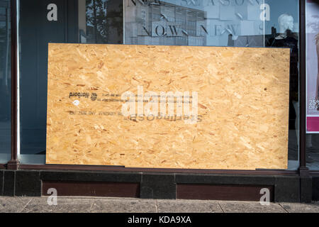 Boarded up shop window, Nottingham, England, UK Stock Photo