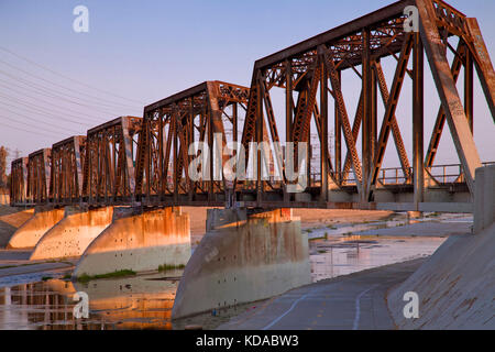 Train trestle bridge over Los Angeles River, South Gate, Los Angeles County, California, USA Stock Photo