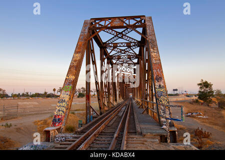 Train trestle bridge over Los Angeles River, South Gate, Los Angeles County, California, USA Stock Photo