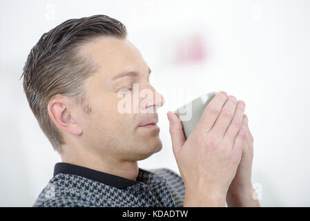 successful banker enjoying his coffee Stock Photo