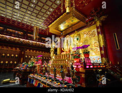 Singapore - Jun 12, 2017. Interior of Tooth Relic Temple in Singapore. The remarkable temple, in the heart of Singapore Chinatown, has much to interes Stock Photo