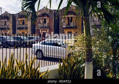 Old houses facades on parking lot by Paseo de Montejo avenue in Merida, Yucatan, Mexico Stock Photo