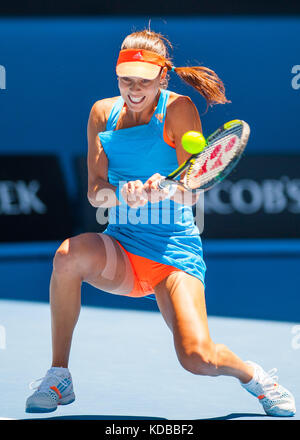 ANA IVANOVIC competes at the Australian Open. The Australian Open - a Grand Slam Tournament - is the opening event of the tennis calendar annually. Stock Photo