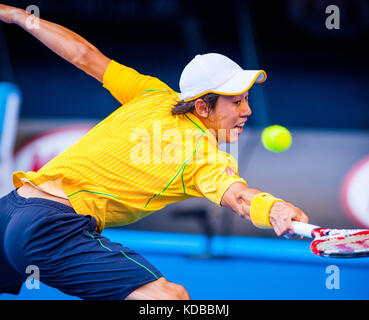 Kei Nishikori (JPN) presented a strong challenge to number one seeded R. Nadal (ESP) in the men's singles division in day eight of the Australian Open Stock Photo