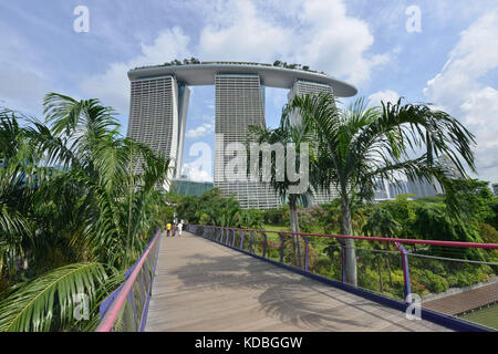 Singapore. The Marina Bay Sands, huge hotel complex with three hotels of 55 floors, a rooftop terrace covering one hectare, 2.560 rooms, a casino and  Stock Photo