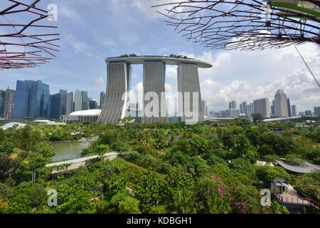 Singapore. The Marina Bay Sands, huge hotel complex with three hotels of 55 floors, a rooftop terrace covering one hectare, 2.560 rooms, a casino and  Stock Photo