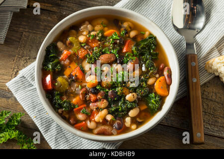 Hot Organic Homemade 10 Bean Soup in a Bowl Stock Photo