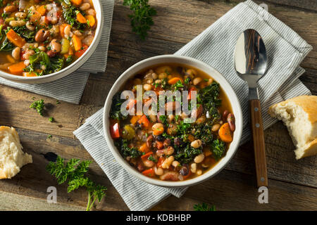 Hot Organic Homemade 10 Bean Soup in a Bowl Stock Photo