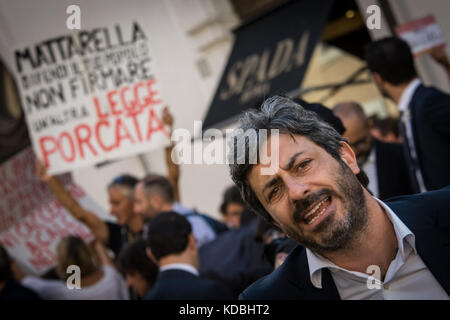 Rome, Italy. 11th Oct, 2017. Rome, Italy October 11, 2017 Supporters of the anti-establishment 5-Star Movement (M5S) stage a protest outside the Lower House against the government's decision to put a bill for a new election law to confidence votes, in Rome, Italy, 11 October 2017. The M5S say the bill is designed to scupper their chances of winning the next election, set to take place early in 2018. in the pictured Roberto Fico 5 Star Movement (M5S) Credit: Andrea Ronchini/Pacific Press/Alamy Live News Stock Photo