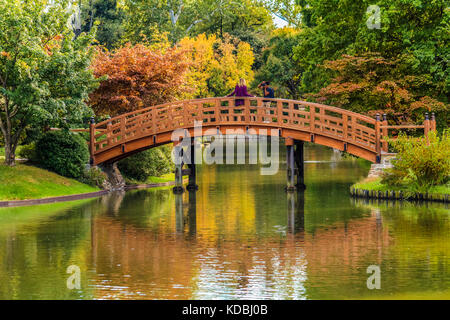 Red Wooden Bridge, The Japanese Garden, Cottered, Hertfordshire Stock ...