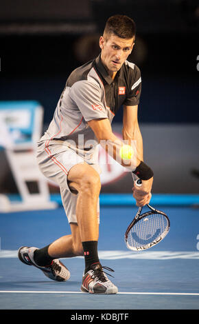 Novak Djokovic (SRB) went up against unseeded Lucas Lacko (SVK)  in day one play of the 2014 Australian Open In Melbourne. Djokovic defeated Lacko 6-3 Stock Photo