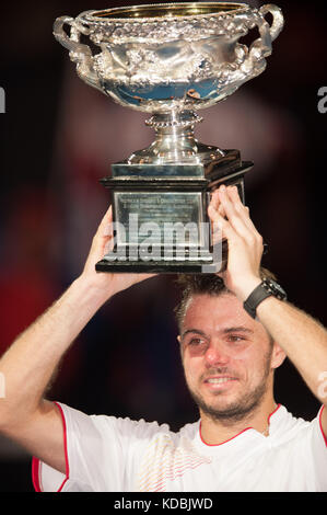 Stanislaus Wawrinka of Switzerland - here with the championship trophy -defeated the number one player in the world R. Nadal of Spain to claim the 201 Stock Photo