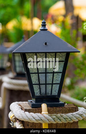 lantern in retro style of metal and glass close-up on the street Stock Photo