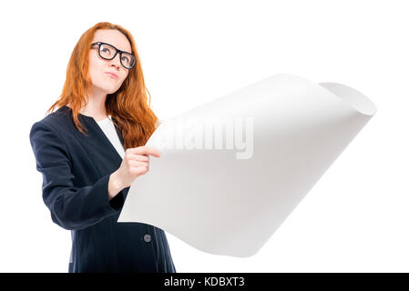 thoughtful successful architect with blueprints on white background in studio Stock Photo