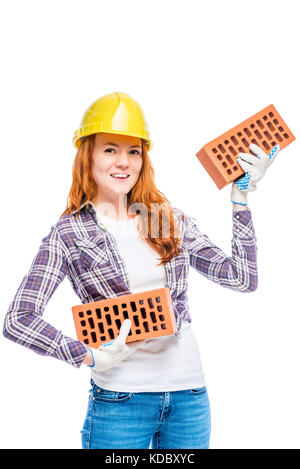 strong woman builder in yellow breeze with bricks on white background Stock Photo