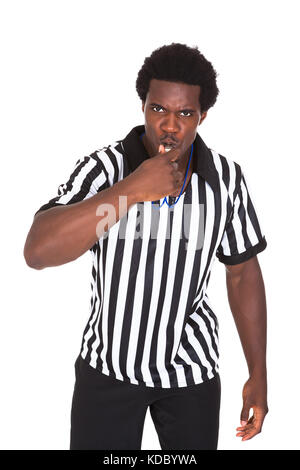 Portrait Of African Referee Isolated Over White Background Stock Photo