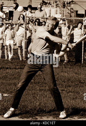Jimmy Carter plays softball in his hometown of Plains, Georgia. Carter was pitcher and captain of his team that was comprised of off duty U.S. Secret  Stock Photo