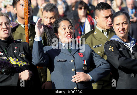 New Zealand military personnal performing the traditional Maori greeting, the Hongi, during the New Zealand national commemoration for the Battle of Passchendaele at Tyne Cot Cemetery, Belgium. Stock Photo