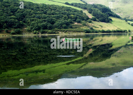 single boat on lake in wales Stock Photo