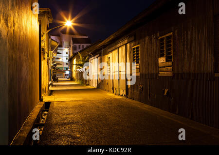 Urban city alley at night Stock Photo