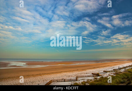 Breaking waves on an isolated Norfolk beach Stock Photo