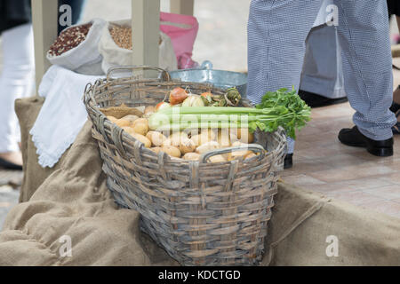 Asti, Italy - September 10, 2017: basket full of potatoes and celery Stock Photo