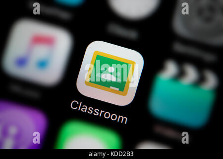 A close-up shot of the logo representing Google Classroom app icon, as seen on the screen of a smart phone (Editorial use only) Stock Photo
