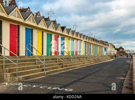 Beach Huts with colourful doors along Lowestoft Beach on the Suffolk coast, England Stock Photo