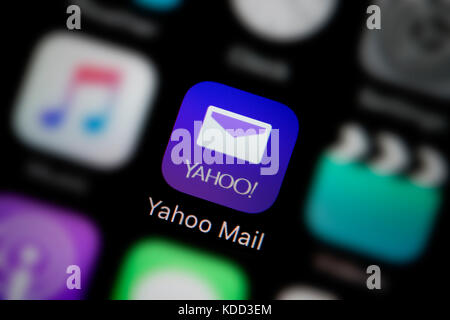 A close-up shot of the logo representing the Yahoo Mail app icon, as seen on the screen of a smart phone (Editorial use only) Stock Photo