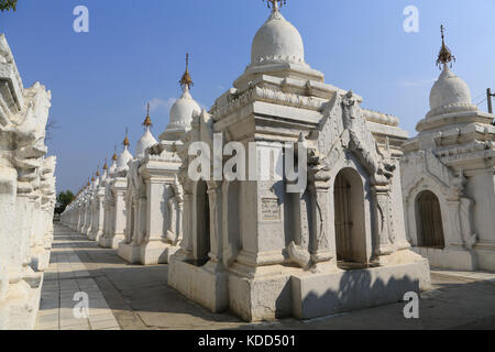 Maha Lokamarazein Kuthodaw Pagoda at Mandalay in Myanmar (Burma) is a UNESCO site and has the Buddhist Canon inscribed on 729 marble stone slabs. Stock Photo