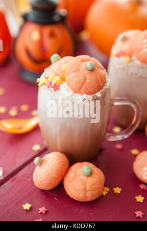 Hot chocolate with marshmallows in a pumpkin shape Stock Photo