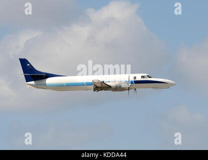 Modern turboprop airplane in flight side view Stock Photo - Alamy