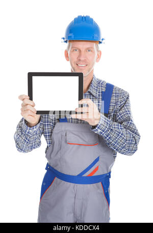 Portrait Of Male Architect Showing Digital Tablet On White Background Stock Photo