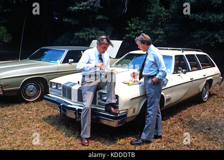 President Jimmy Carter and Vice President Walter Mondale get away from the crowd for a private talk while attending a church picnic at the Plains Bapt Stock Photo