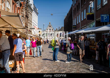 Dordrecht, Netherlands - July 7 2013: People searching for books during the annual book market in the centre of Dordrecht. The market, with 300 bookse Stock Photo