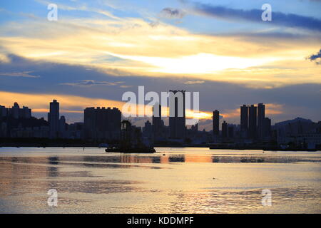 Magical moment of sunset in Hong Kong Stock Photo - Alamy