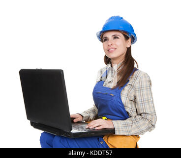Female Worker Working On Laptop Over White Background Stock Photo