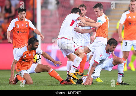 Brisbane, QUEENSLAND, AUSTRALIA. 13th Oct, 2017. Adelaide players Isaias (#8, centre), Vince Lia (#6, right) and Brisbane Roar players Fahid Ben Khalfallah (#14, left) and Matt McKay (#17, second from right) compete for the ball during the round two A-League match between the Brisbane Roar and Adelaide United at Suncorp Stadium on October 13, 2017 in Brisbane, Australia. Credit: Albert Perez/ZUMA Wire/Alamy Live News Stock Photo