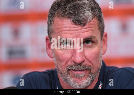 Brisbane, QUEENSLAND, AUSTRALIA. 13th Oct, 2017. Adelaide head coach Marco Kurz speaks to the media after their victory in the round two A-League match between the Brisbane Roar and Adelaide United at Suncorp Stadium on October 13, 2017 in Brisbane, Australia. Credit: Albert Perez/ZUMA Wire/Alamy Live News Stock Photo