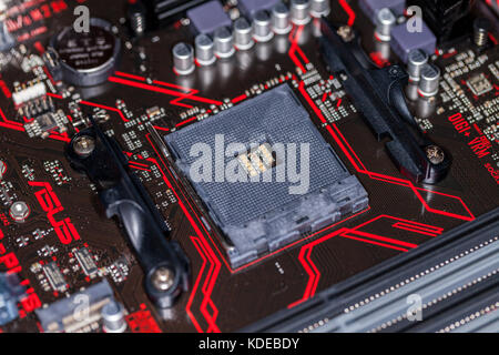HANNOVER / GERMANY - OCTOBER 12, 2017: computer base plate for the central processing unit on Asus Prime 350 Plus mainboard Stock Photo