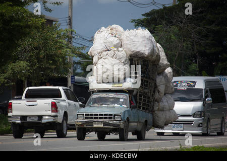 CHIANG MAI, THAILAND -SEPTEMBER 28 2017:  Over Load  Private Isuzu KB Old Pickup car. Photo at road no 121 about 8 km from downtown Chiangmai thailand Stock Photo